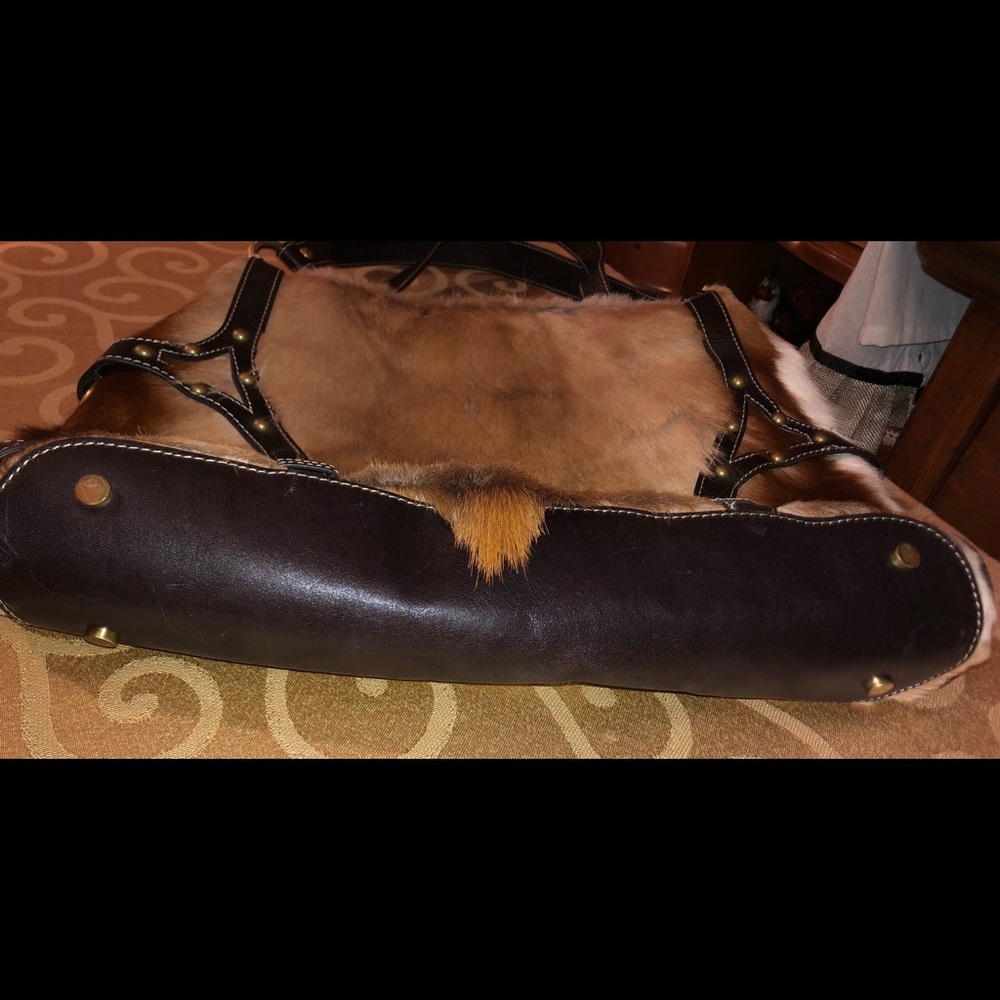 Dian Gail Fur purse.